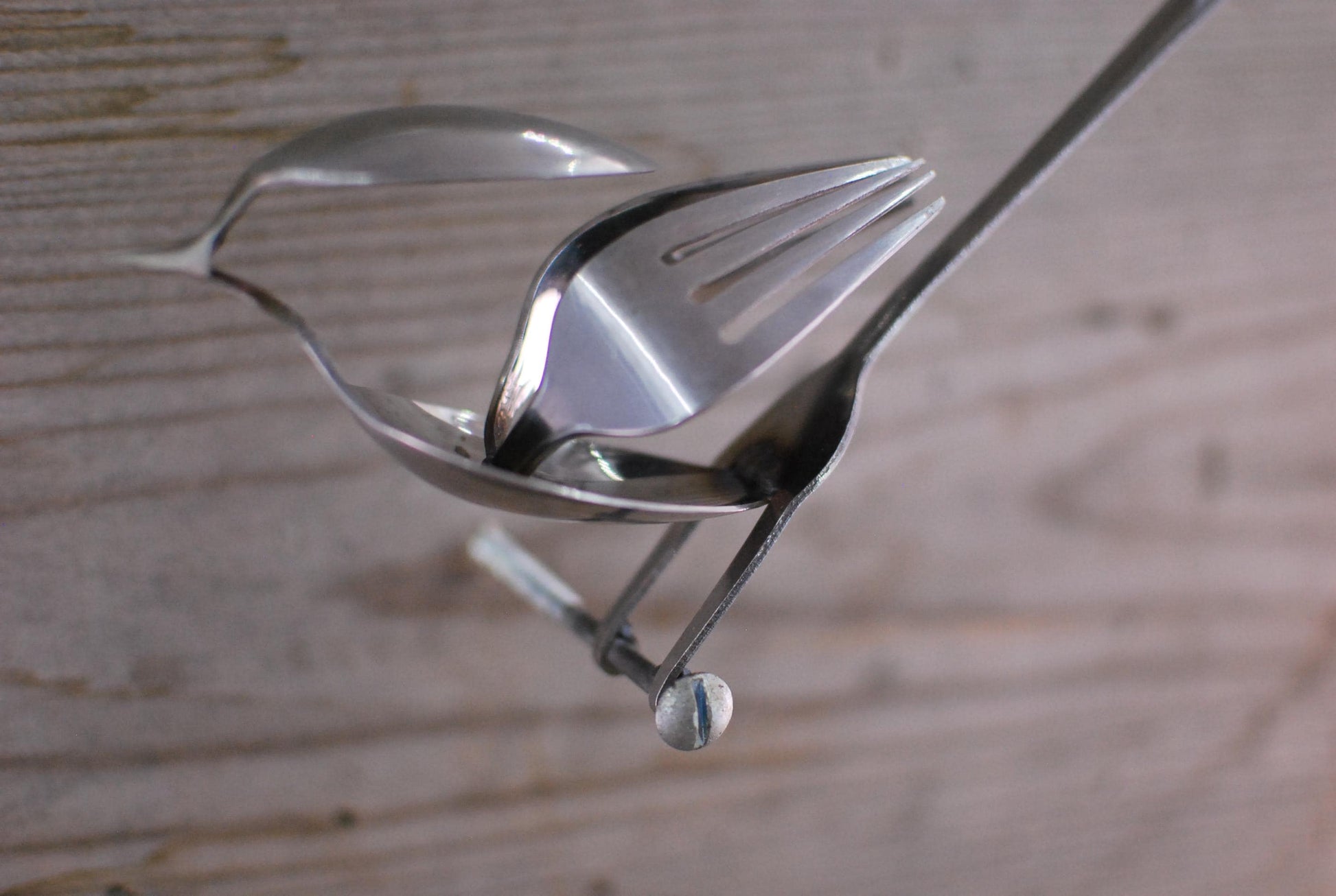 Recycled Silverware Bird Sculpture: Minimalist Metal Art
