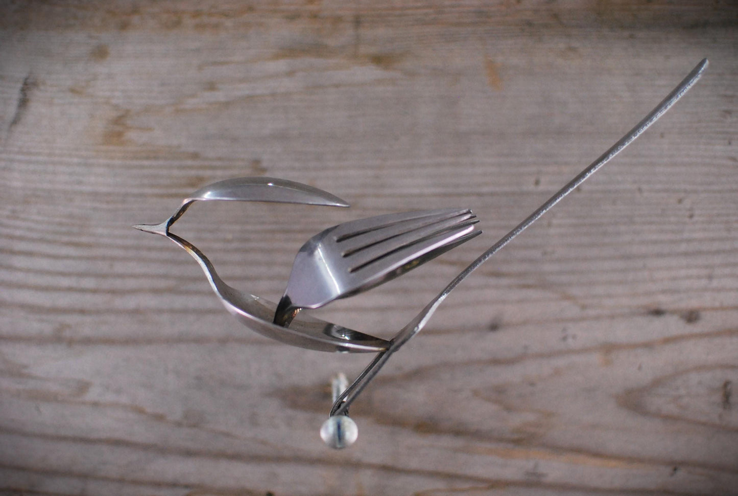 Recycled Silverware Bird Sculpture: Minimalist Metal Art