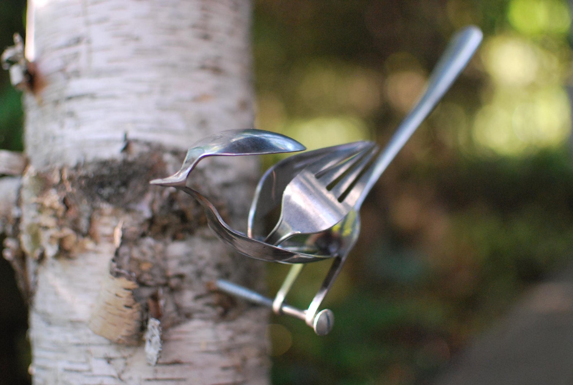 Recycled Silverware Bird Sculpture: Minimalist Metal Art