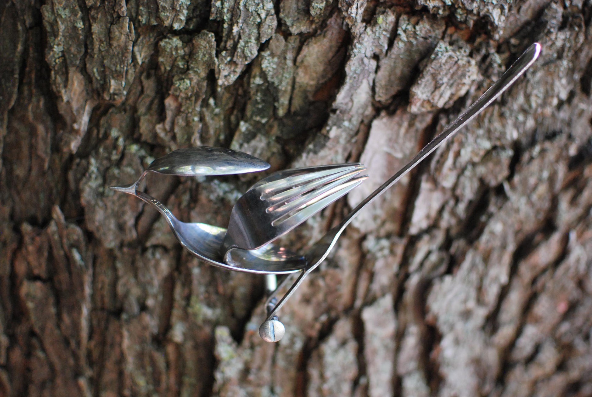 Recycled Silverware Bird Sculpture: Minimalist Metal Art